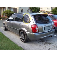 MAZDA 323 BJ ASTINA - 9/1998 to 12/2003 - 5DR HATCH - LEFT SIDE REAR OPERA  GLASS - PRIVACY TINTED  - (Second-hand)