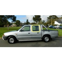 FORD COURIER PC/PD - 2/1985 to 1/1999 - 4DR DUAL CAB - LEFT SIDE REAR DOOR GLASS - GREEN - NEW