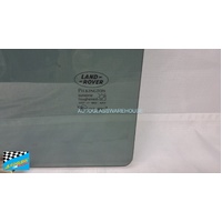 LAND ROVER DISCOVERY DISCO 1 & 2 - 3/1991 to 11/2004 - 4DR WAGON - DRIVERS - RIGHT SIDE REAR DOOR GLASS - PRIVACY TINT - (SECOND-HAND)