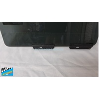 JEEP GRAND CHEROKEE ZG - 4/1996 to 5/1999 - 4DR WAGON - LEFT SIDE REAR DOOR GLASS - PRIVACY TINT - (Second-hand)