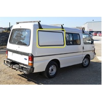 FORD ECONOVAN JG/JH SERIES - 5/1984 to 12/2005 - MWB VAN - DRIVERS - RIGHT SIDE REAR FIXED GLASS (495H X 1280L) - GREY - NEW