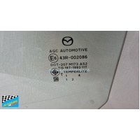 MAZDA 2 DJ - 8/2014 TO CURRENT - 5DR HATCH - PASSENGERS - LEFT SIDE REAR DOOR GLASS - GREEN WITH FITTINGS - NEW