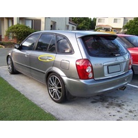 MAZDA 323 BJ PROTAGE - 9/1998 to 12/2003 - SEDAN/HATCH - PASSENGERS -  LEFT SIDE REAR WINDOW REGULATOR - ELECTRIC  - (Second-hand)