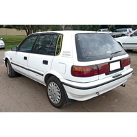 suitable for TOYOTA COROLLA AE92 - 6/1989 to 8/1994 - 5DR HATCH - PASSENGERS - LEFT SIDE REAR OPERA GLASS - NEW