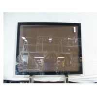 MCA BUS - SIDE GLASS-CERAMIC-1090 X 866 - GLASS SITS ADJACENT TO EMERGENCY DOOR - NEW