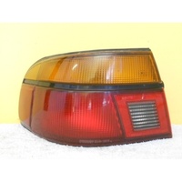 FORD LASER KF/KH - 5DR HATCH 3/90>10/94 - LEFT SIDE TAIL LIGHT-STANLEY 04-1311(Genuine)