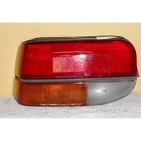 FORD LASER KC - 5DR HATCH 10/85>3/90 - PASSENGERS - LEFT SIDE TAIL LIGHT (Genuine)
