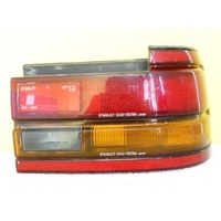FORD TELSTAR AT - 10/1994 TO 2/1999 - 4DR SEDAN - RIGHT SIDE TAIL LIGHT (Genuine)