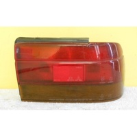 MITSUBISHI LANCER CA/CB - 4DR SEDAN 9/88>9/92 - DRIVER - RIGHT SIDE - TAIL LIGHT (Genuine)