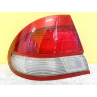 FORD LASER KJ - 4DR SEDAN 10/94>2/99 - PASSENGER - LEFT SIDE - TAIL LIGHT (Genuine)