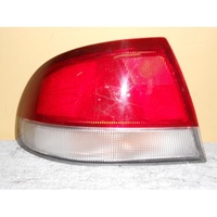 MAZDA 626 GE - 4DR SEDAN 1/92>8/97 - PASSENGER - LEFT SIDE - GENUINE TAIL LIGHT