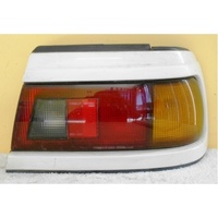 FORD TELSTAR AT - 5DR HATCH 10/94>2/99 - DRIVER - RIGHT SIDE - TAIL LIGHT (Genuine)