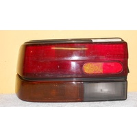 FORD LASER KE - 10/1985 TO 3/1990 - 5DR HATCH - LEFT SIDE TAIL LIGHT - STANLEY 043-7883