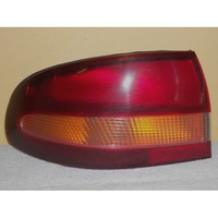 HOLDEN COMMODORE VT - 9/1997 to 7/1999 - 4DR SEDAN- LEFT SIDE TAIL LIGHT - GENUINE - GM158