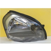 HYUNDAI TUSCON - WAGON 8/04>1/10 - DRIVERS - RIGHT SIDE HEAD LIGHT - NEW - CLEAR BLINKER