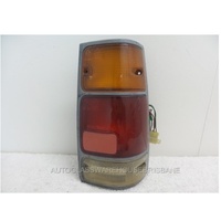 HOLDEN RODEO TF - UTE 7/88>12/96 - PASSENGERS - LEFT SIDE TAIL LIGHT - NEW (BLACK EDGE)