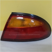 MAZDA 323 BA ASTINA - 7/1994 to 8/1998 - 5DR HATCH - RIGHT SIDE TAIL LIGHT - STERLING