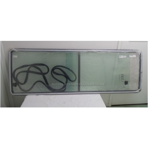 MERCEDES SPRINTER - 2/1998 to 9/2006 - SWB ONLY - LEFT SIDE REAR DOUBLE SLIDING UNIT GLASS - RUBBER FIT ROPE IN - GREEN GLASS - 1820mm X 620mm - NEW