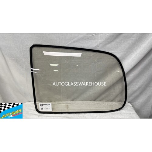 NISSAN SERENA C23 - 92 to 95. LEFT SIDE CARGO GLASS - (Second-hand)
