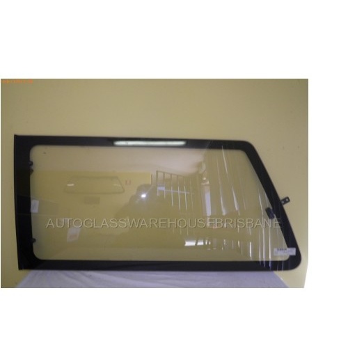 NISSAN LARGO C22 IMPORT - VAN 12/86>12/93 - LEFT SIDE REAR FLIPPER GLASS - (Second-hand) (Pointed top front cnr)