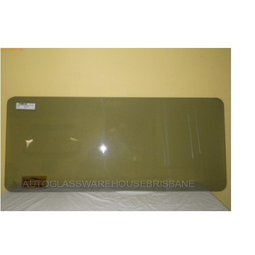 NISSAN URVAN E24 LWB - VAN 3/87>12/93 - LEFT SIDE SLIDING DOOR FIXED GLASS - (1064 x 459) - (Second-hand)