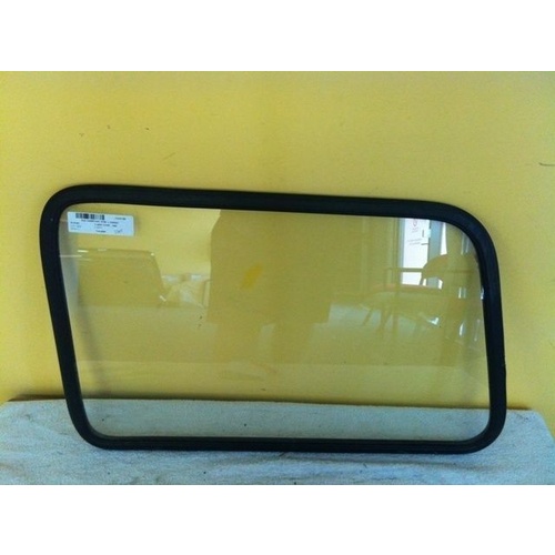 SUZUKI CARRY ST90V - 1/1980 to 6/1985 - UTE - PASSENGERS - LEFT SIDE REAR CARGO GLASS (680w X 420h) - (Second-hand)