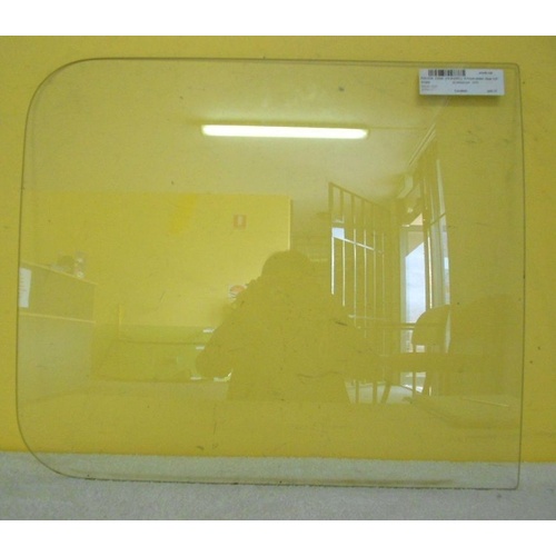 FORD ECONOVAN E2200 - 1979 MODEL - VAN - DRIVERS - RIGHT SIDE FRONT SLIDING GLASS (REAR PIECE) - 454h X  530w - (Second-hand)
