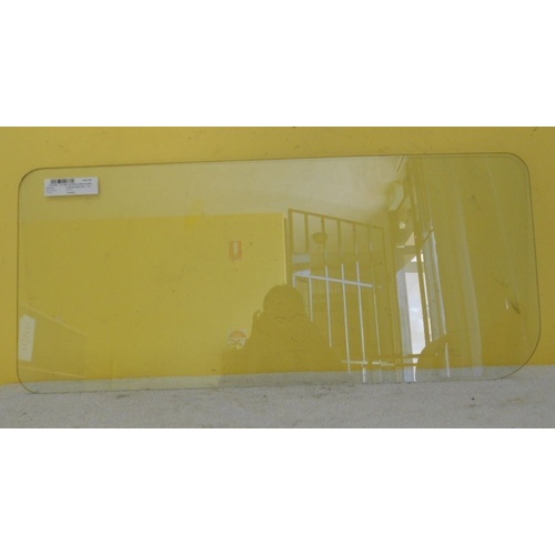 suitable for TOYOTA LANDCRUISER 40 SERIES - 1/1979 to 11/1984 - SWB WAGON - DRIVERS - RIGHT SIDE REAR CARGO GLASS - 848w X 373h - (Second-hand)